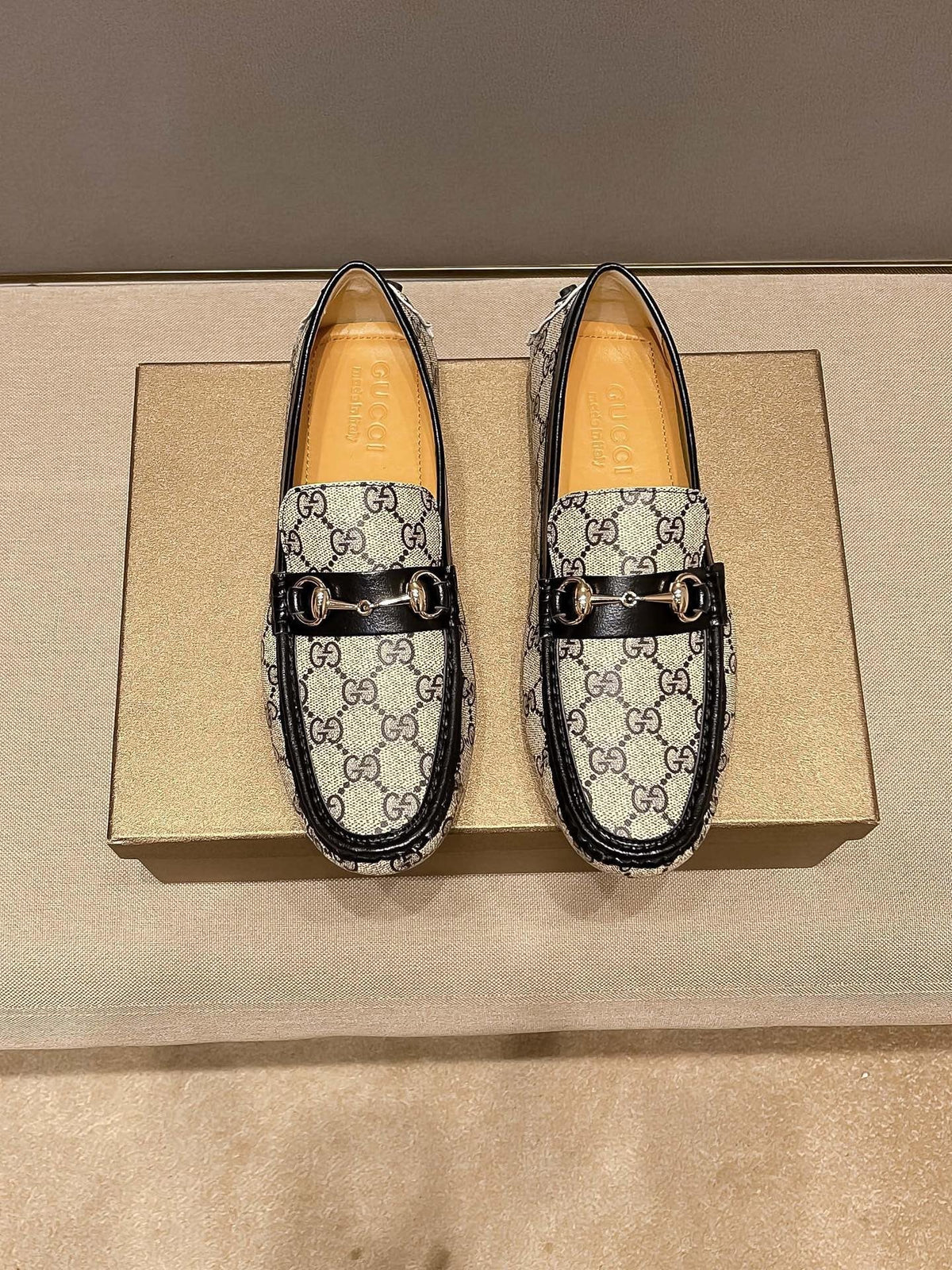 Gucci Beige and Black Gold-Hardware Loafers